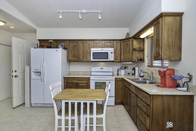 13405 E 54th St, Yuma, AZ 85367 - kitchen with open shelves, a sink, light tile patterned floors, light countertops, and white appliances