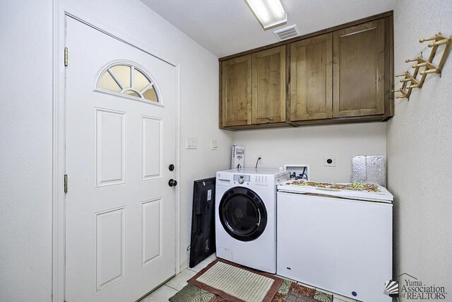 13405 E 54th St, Yuma, AZ 85367 - clothes washing area with cabinet space, independent washer and dryer, visible vents, and light tile patterned floors