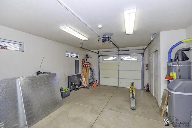 13405 E 54th St, Yuma, AZ 85367 - garage with a garage door opener and water heater