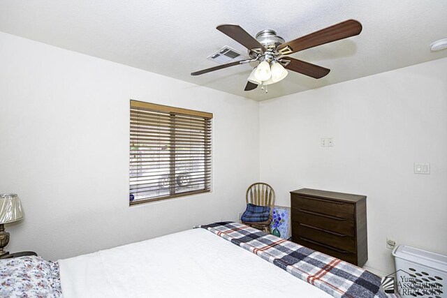 13405 E 54th St, Yuma, AZ 85367 - bedroom featuring ceiling fan and visible vents