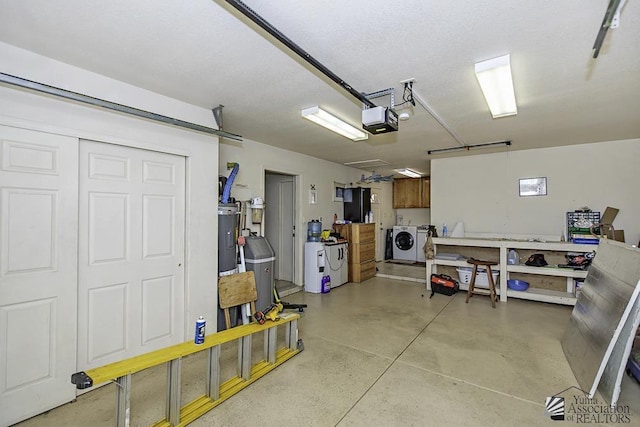 13405 E 54th St, Yuma, AZ 85367 - garage featuring independent washer and dryer, water heater, and a garage door opener