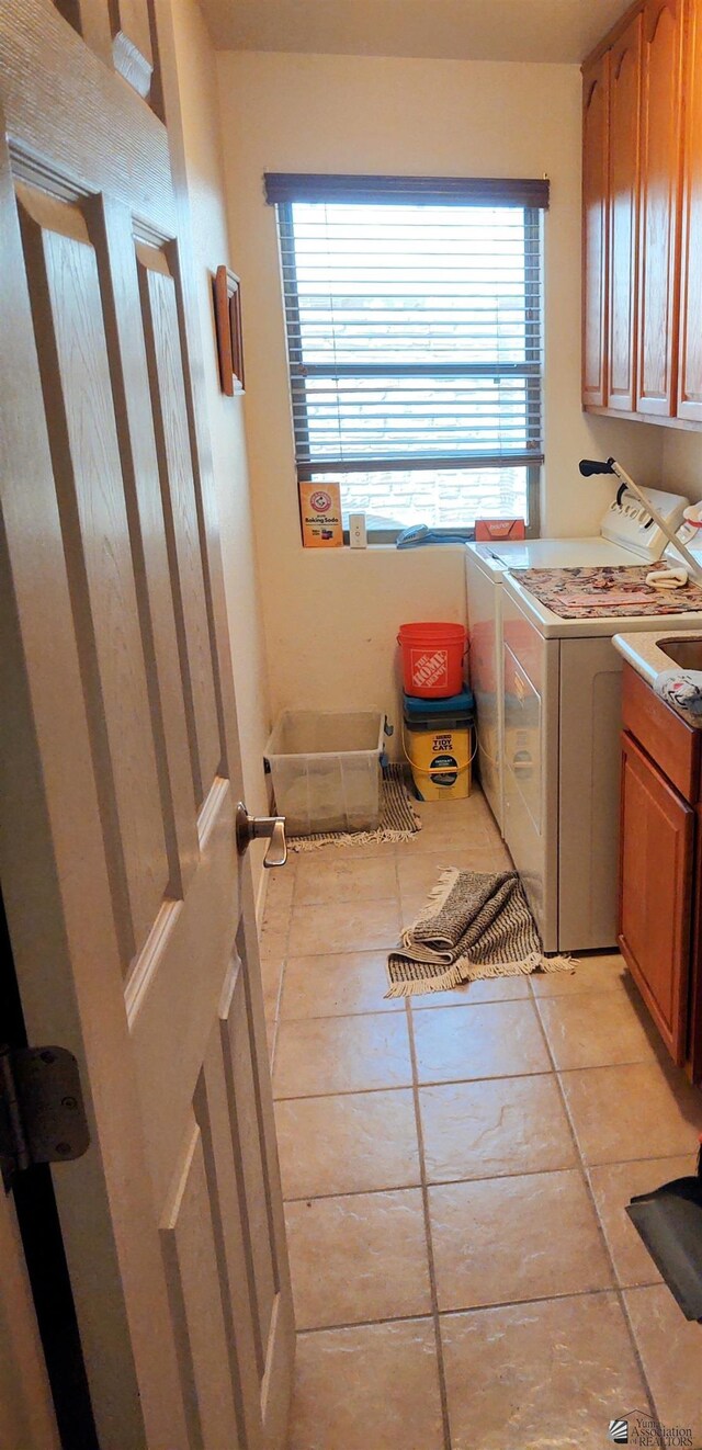 13375 E 52nd St, Yuma, AZ 85367 - clothes washing area with cabinet space, independent washer and dryer, and healthy amount of natural light