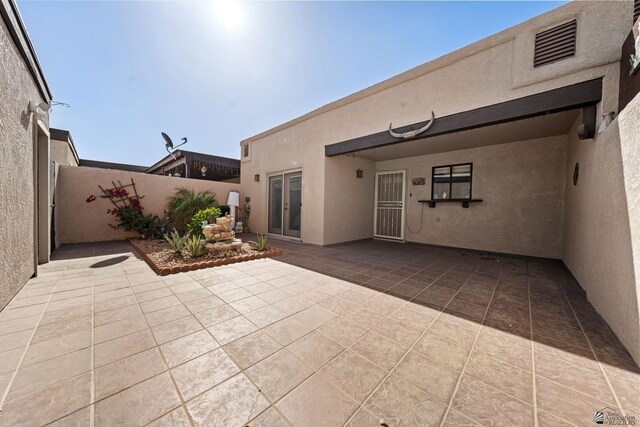 11230 E 37th Pl Unit 131, Yuma, AZ 85367 - view of patio with french doors