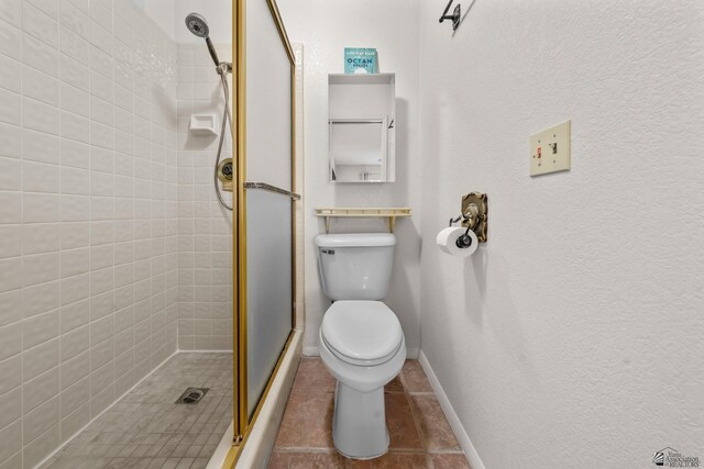11230 E 37th Pl Unit 131, Yuma, AZ 85367 - bathroom featuring a stall shower and tile patterned flooring