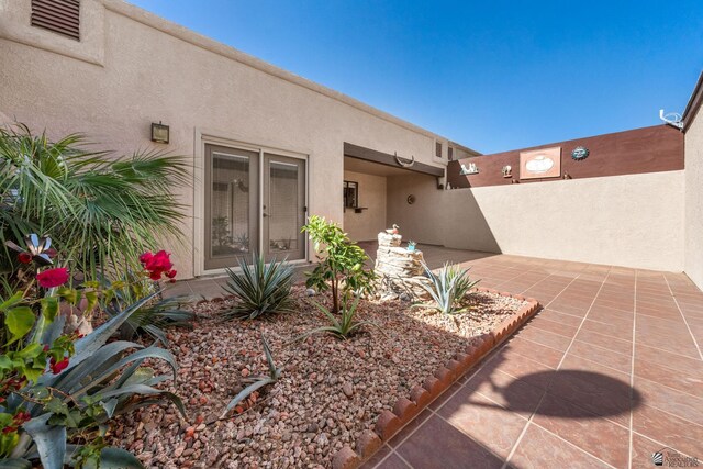 11230 E 37th Pl Unit 131, Yuma, AZ 85367 - entrance to property featuring stucco siding and a patio