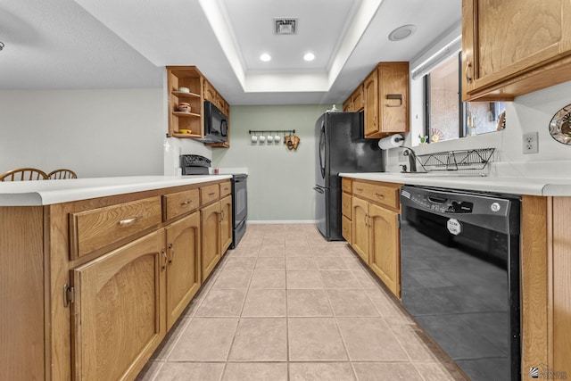 11230 E 37th Pl Unit 131, Yuma, AZ 85367 - kitchen featuring black appliances, light countertops, a peninsula, open shelves, and brown cabinets