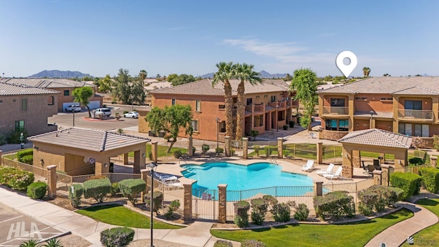 3591 W 22 Street 3591W 22Nd Street, #E, Yuma, AZ 85364 - community pool with a gazebo, fence, a residential view, and a mountain view