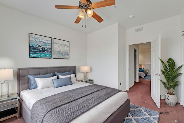 3591 W 22 Street 3591W 22Nd Street, #E, Yuma, AZ 85364 - carpeted bedroom with baseboards, a ceiling fan, and visible vents
