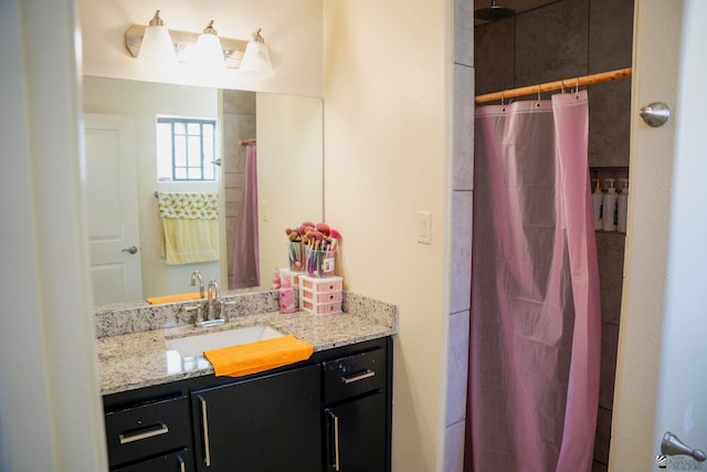 bathroom featuring vanity and a shower with curtain