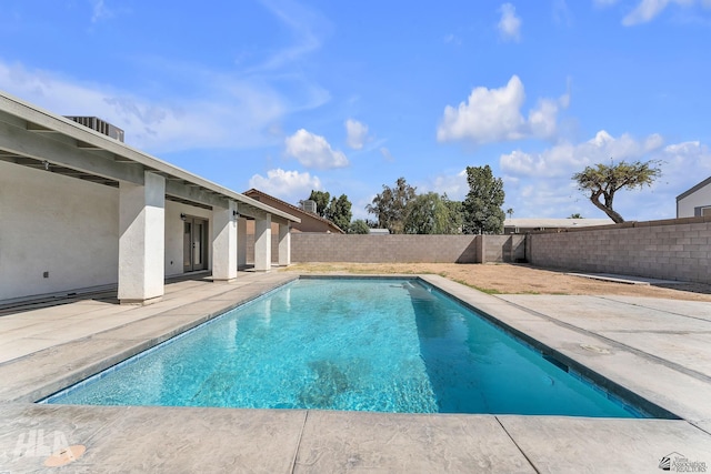 view of pool with a patio, a fenced backyard, and a fenced in pool