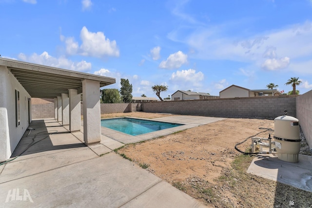 view of pool featuring a fenced in pool, a patio area, and a fenced backyard