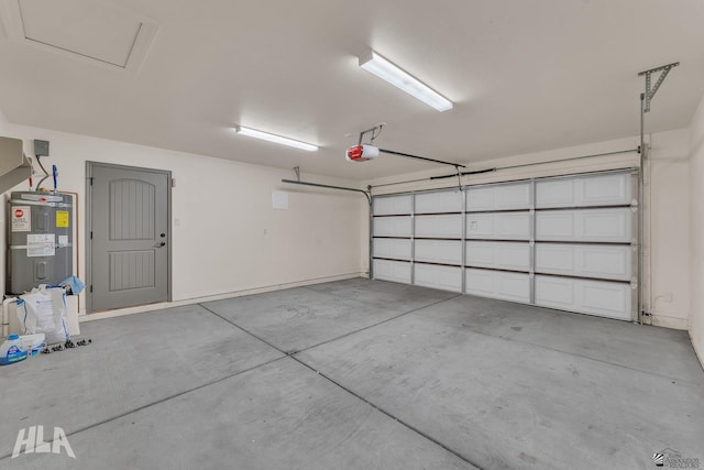 garage featuring a garage door opener and water heater