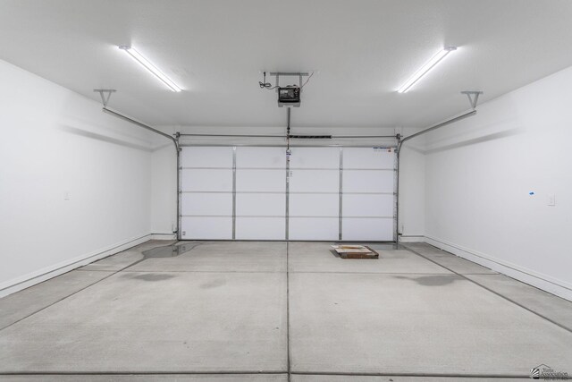10849 E 45th Pl, Yuma, AZ 85367 - garage featuring a garage door opener and baseboards