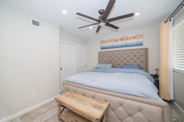 1790 S Meadowbrook Ave, Yuma, AZ 85364 - bedroom featuring visible vents, a closet, wood finished floors, baseboards, and recessed lighting