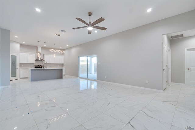 3539 S Akers Way, Yuma, AZ 85365 - unfurnished living room with a ceiling fan, visible vents, baseboards, marble finish floor, and recessed lighting
