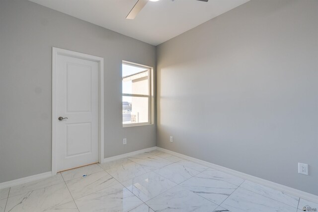 3539 S Akers Way, Yuma, AZ 85365 - empty room featuring baseboards, marble finish floor, and ceiling fan