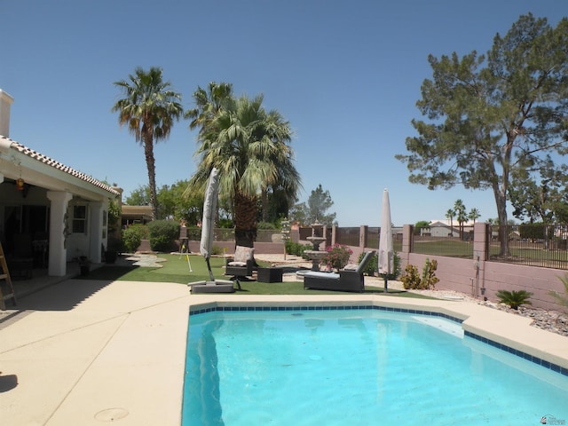 10224 S Fairway Ln, Yuma, AZ 85367 - view of pool with a putting area, a patio area, and fence