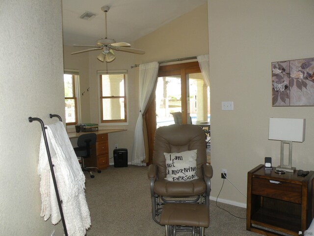 10224 S Fairway Ln, Yuma, AZ 85367 - sitting room featuring an office area, a ceiling fan, light colored carpet, vaulted ceiling, and baseboards