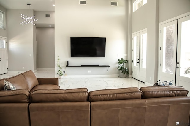12815 S Greenview Way Greenview Way, Yuma, AZ 85365 - living room with marble look tile flooring, a towering ceiling, healthy amount of natural light, and recessed lighting