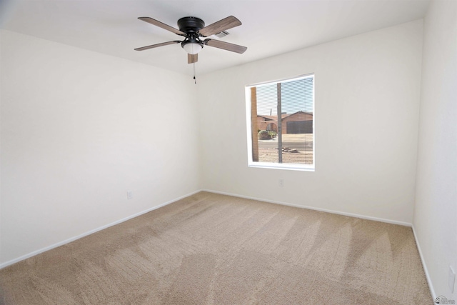 3120 W 16th Pl, Yuma, AZ 85364 - empty room featuring carpet flooring and ceiling fan