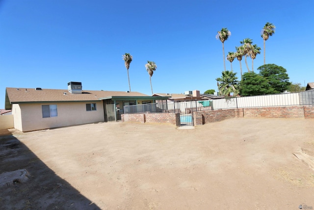 3120 W 16th Pl, Yuma, AZ 85364 - rear view of house featuring stucco siding