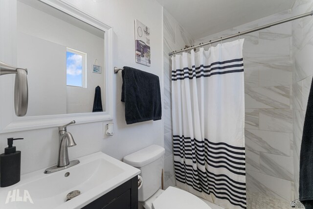 2605 S Nogales Ave, Yuma, AZ 85364 - bathroom featuring vanity and a tile shower
