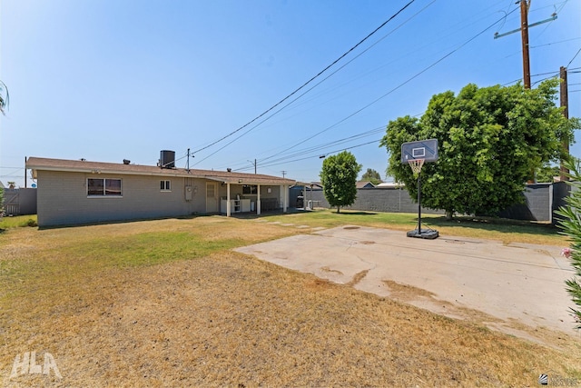 2605 S Nogales Ave, Yuma, AZ 85364 - back of property featuring brick siding and a patio