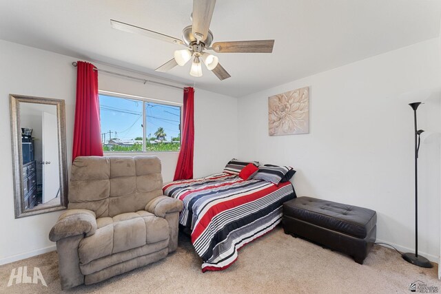 2605 S Nogales Ave, Yuma, AZ 85364 - carpeted bedroom featuring baseboards and ceiling fan