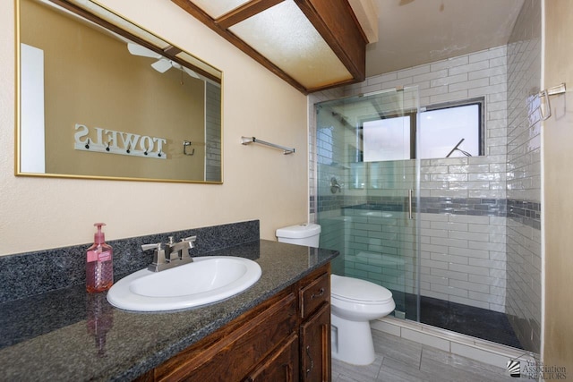 12510 E Del Rico, Yuma, AZ 85367 - full bathroom with vanity, a shower stall, and toilet