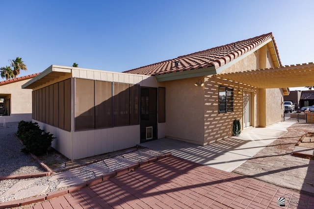 12510 E Del Rico, Yuma, AZ 85367 - rear view of house featuring a patio area, stucco siding, and a tiled roof