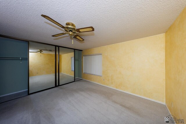 12510 E Del Rico, Yuma, AZ 85367 - unfurnished bedroom with baseboards, a textured ceiling, carpet, and ceiling fan