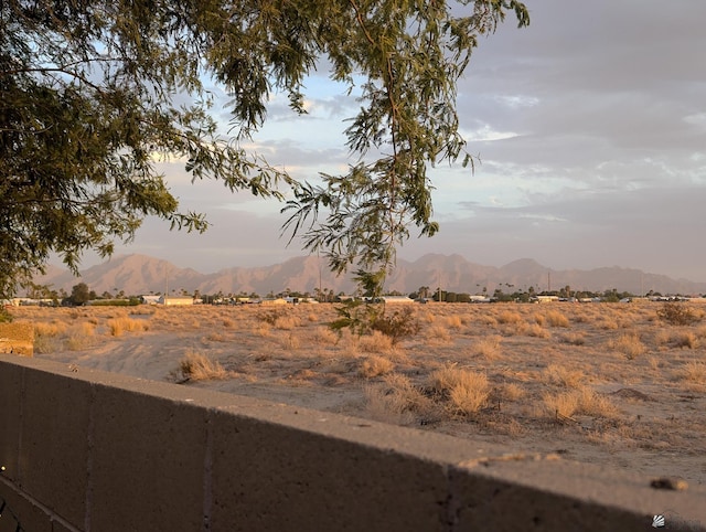 view of mountain feature with a rural view