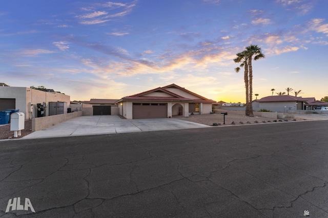 11683 E Via Salida, Yuma, AZ 85367 - mediterranean / spanish home with an attached garage, driveway, and stucco siding