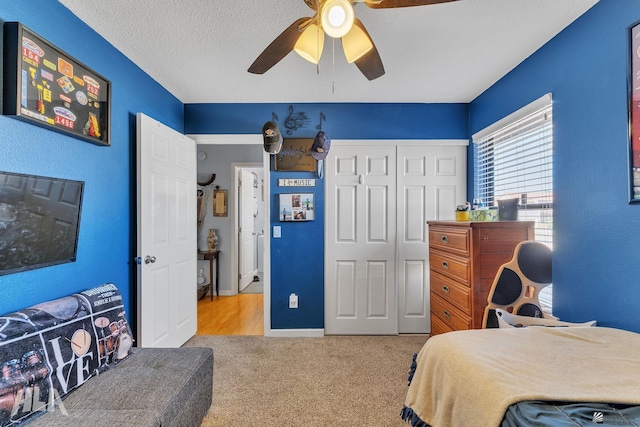11683 E Via Salida, Yuma, AZ 85367 - bedroom featuring carpet floors, baseboards, a ceiling fan, and a closet