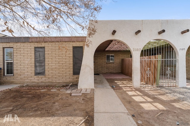 2102 S 11th Ave, Yuma, AZ 85364 - property entrance with brick siding