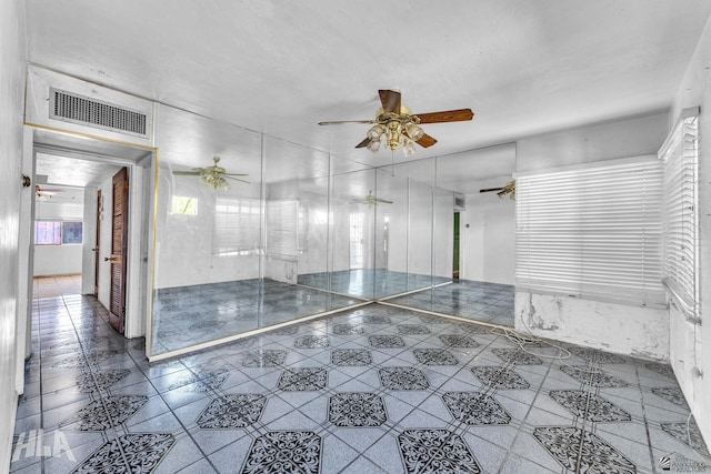 1802 S 11th Ave, Yuma, AZ 85364 - tiled empty room with ceiling fan