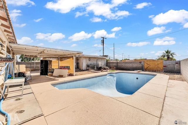 1802 S 11th Ave, Yuma, AZ 85364 - view of swimming pool featuring a patio area and a fenced backyard