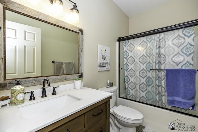 full bath with toilet, bathtub / shower combination, and vanity
