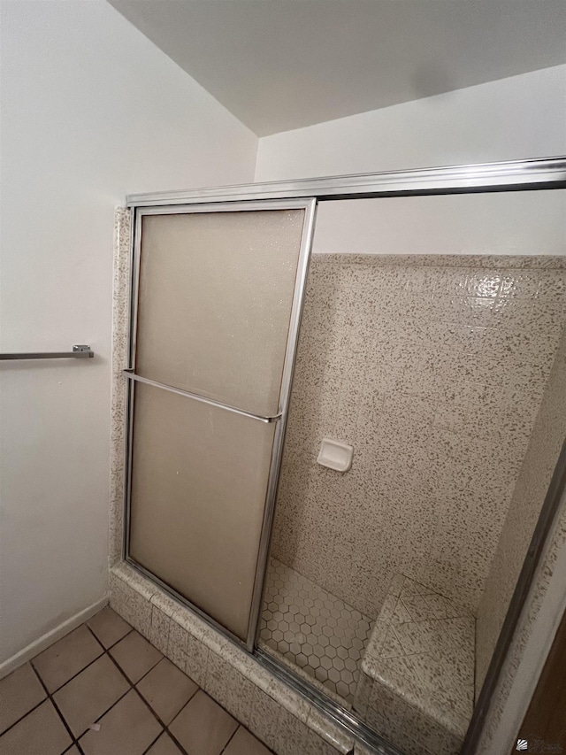 2801 S 1st Ave, Yuma, AZ 85364 - bathroom featuring a stall shower, tile patterned flooring, and baseboards