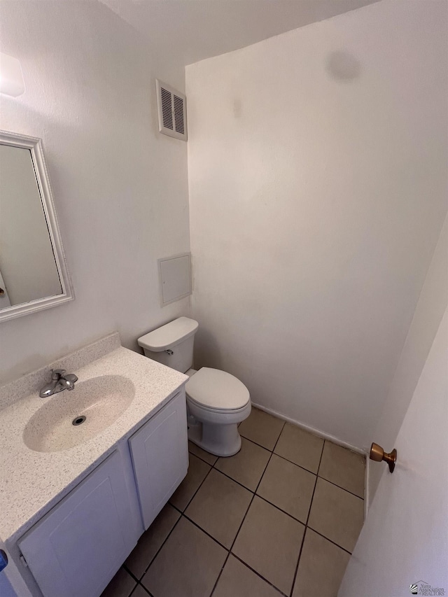 2801 S 1st Ave, Yuma, AZ 85364 - bathroom with toilet, tile patterned flooring, and vanity