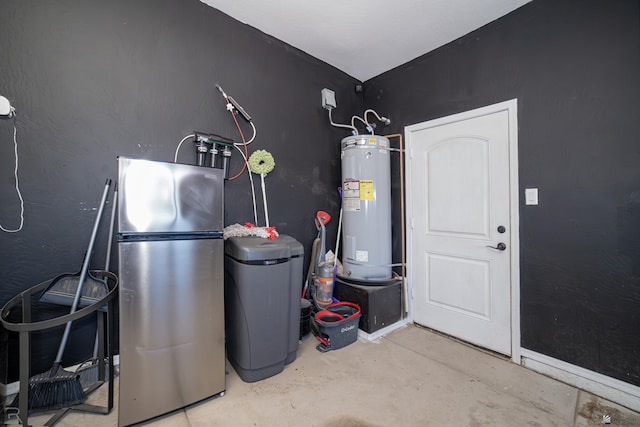 utility room featuring electric water heater