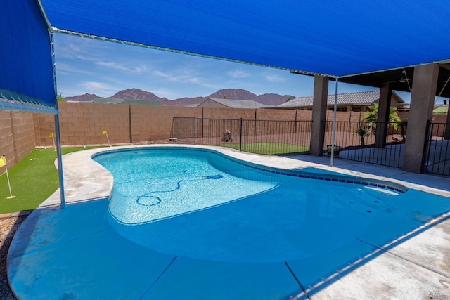12839 S Drucilla Ln, Yuma, AZ 85367 - view of pool with a mountain view, a fenced backyard, and a patio area