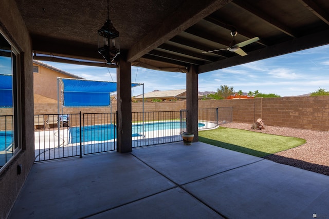 12839 S Drucilla Ln, Yuma, AZ 85367 - fenced backyard with a patio area and a ceiling fan