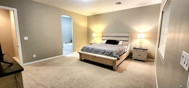 14817 E 47th Dr, Yuma, AZ 85367 - bedroom with light carpet and arched walkways