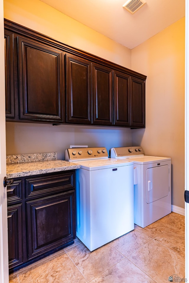 14817 E 47th Dr, Yuma, AZ 85367 - laundry area with cabinet space and independent washer and dryer