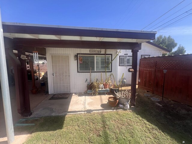 1911 S 11th Ave, Yuma, AZ 85364 - rear view of property with a patio