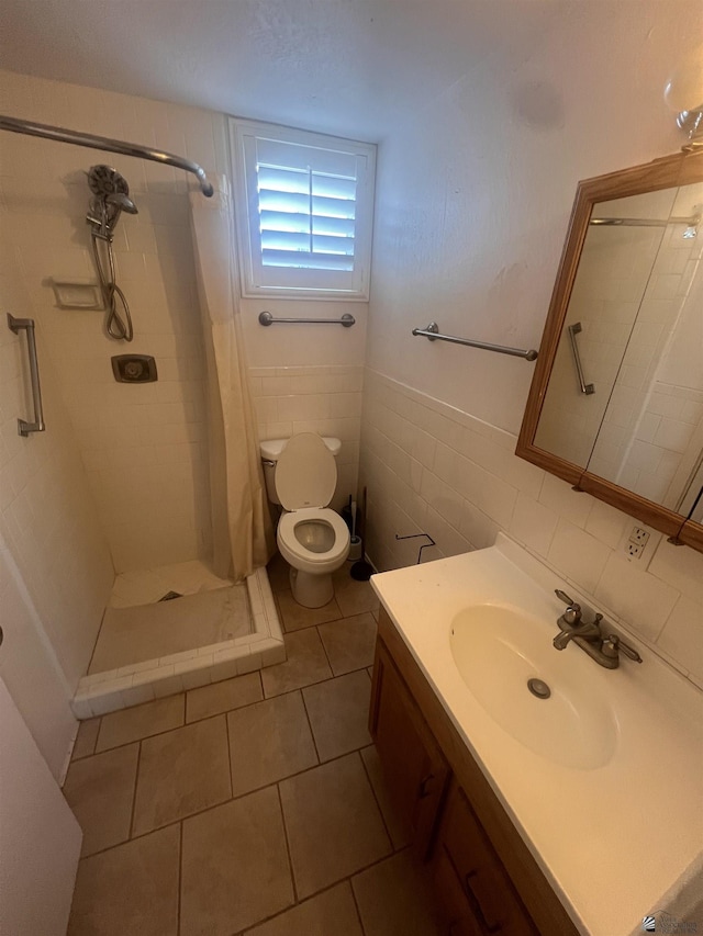 1911 S 11th Ave, Yuma, AZ 85364 - full bathroom with toilet, vanity, a stall shower, and tile patterned floors