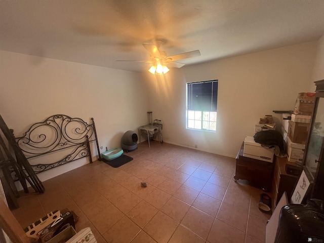 1911 S 11th Ave, Yuma, AZ 85364 - unfurnished room with a ceiling fan, tile patterned floors, and baseboards