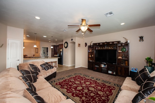 12127 E 35th St, Yuma, AZ 85367 - living area featuring ceiling fan, visible vents, baseboards, light carpet, and recessed lighting