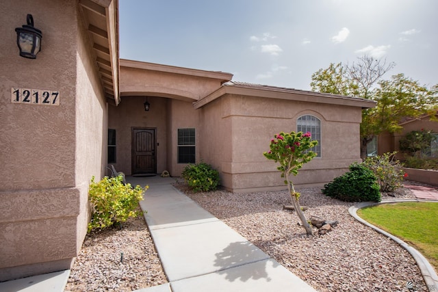 12127 E 35th St, Yuma, AZ 85367 - view of exterior entry featuring stucco siding